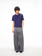 JCAESAR Armored‑style striped trousers with curved side panels