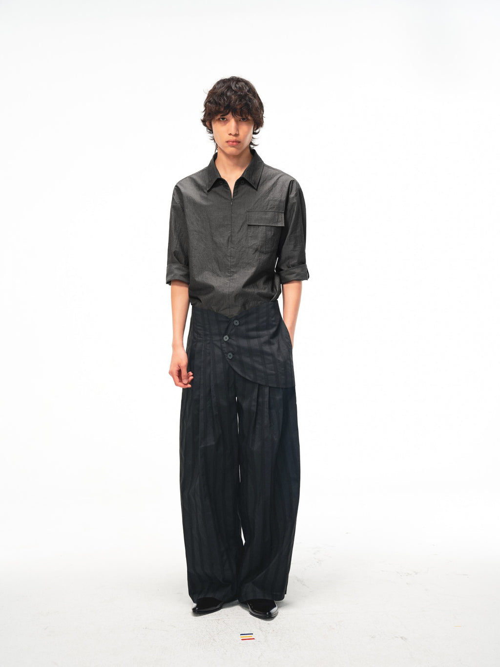 JCAESAR Armored‑style striped trousers with curved side panels