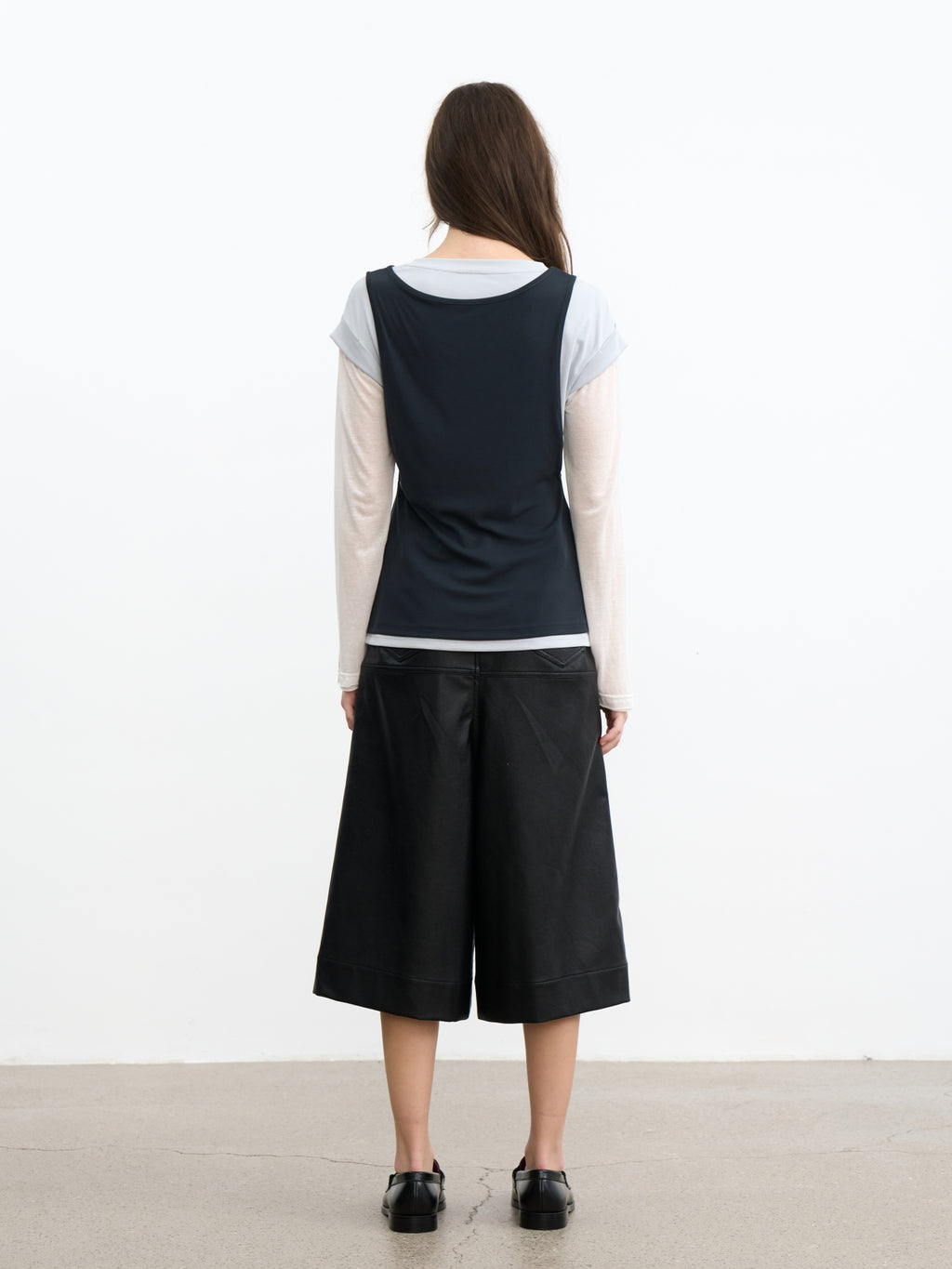 JCAESAR WOMEN Saddle‑pleated body‑hugging leather pants