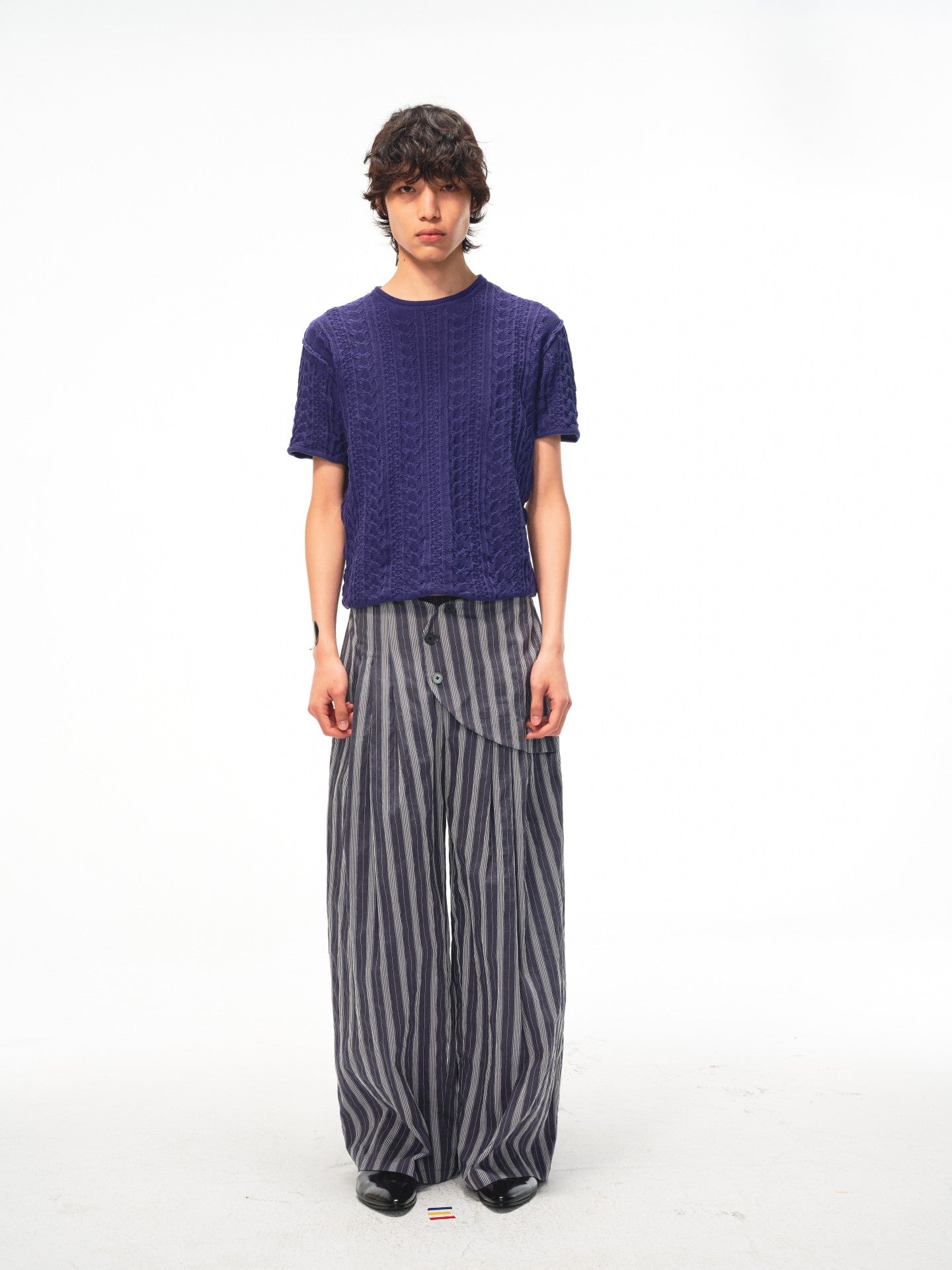 JCAESAR Armored‑style striped trousers with curved side panels