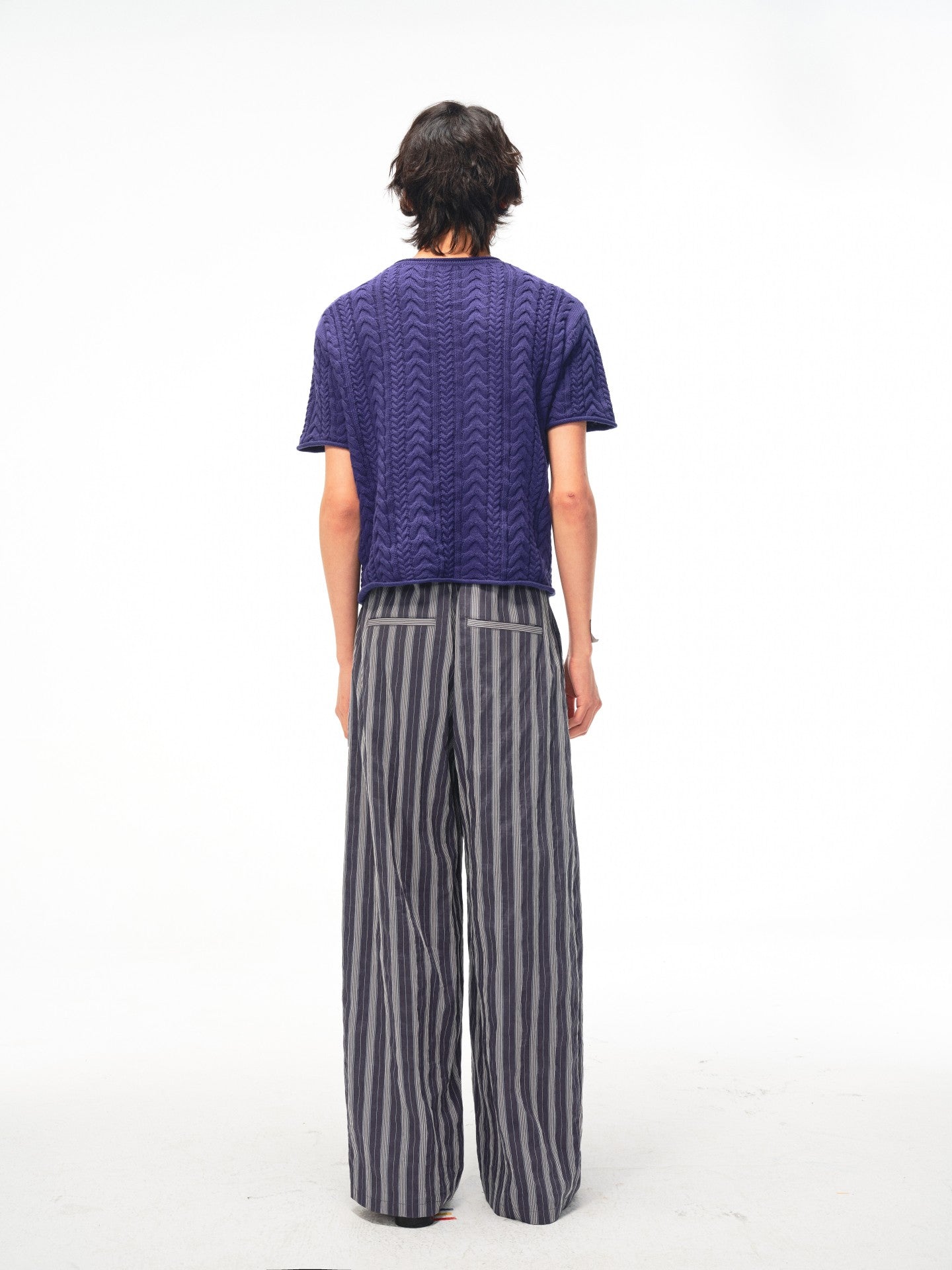 JCAESAR Armored‑style striped trousers with curved side panels