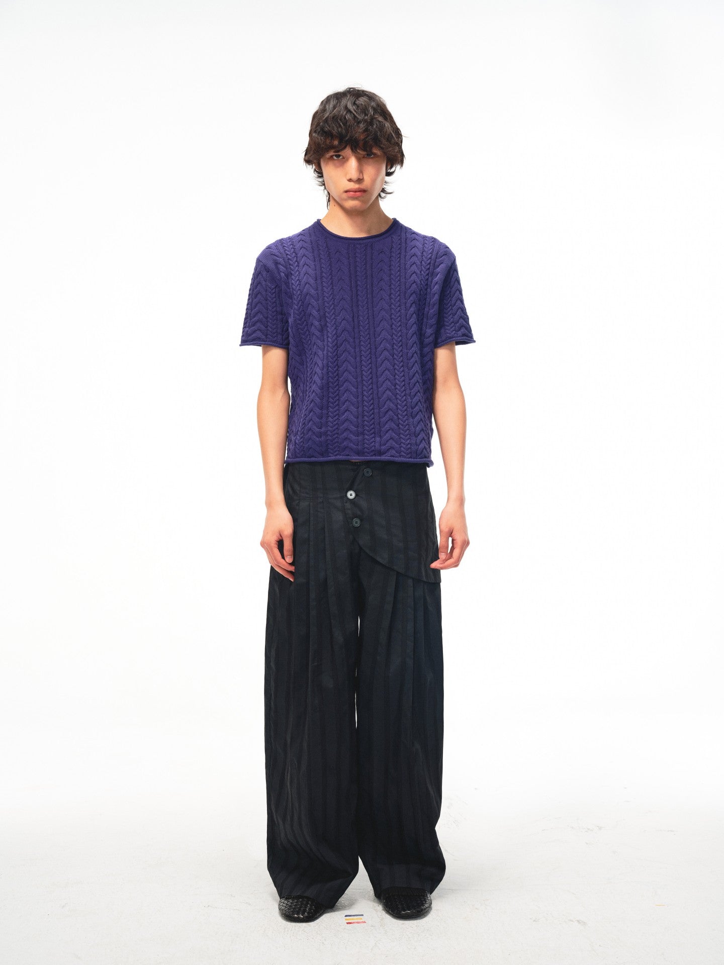 JCAESAR Armored‑style striped trousers with curved side panels
