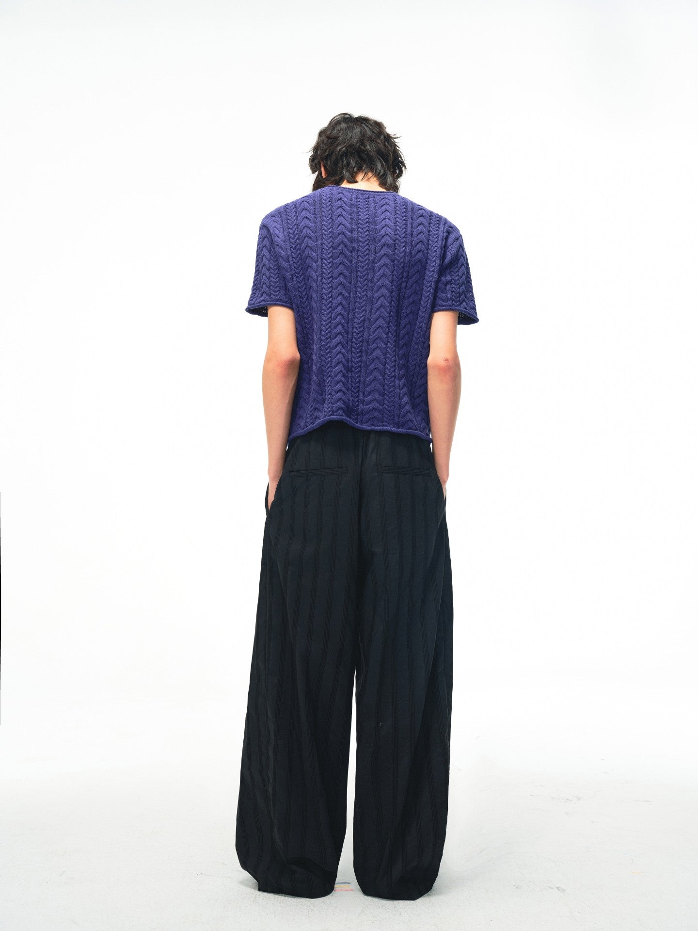 JCAESAR Armored‑style striped trousers with curved side panels