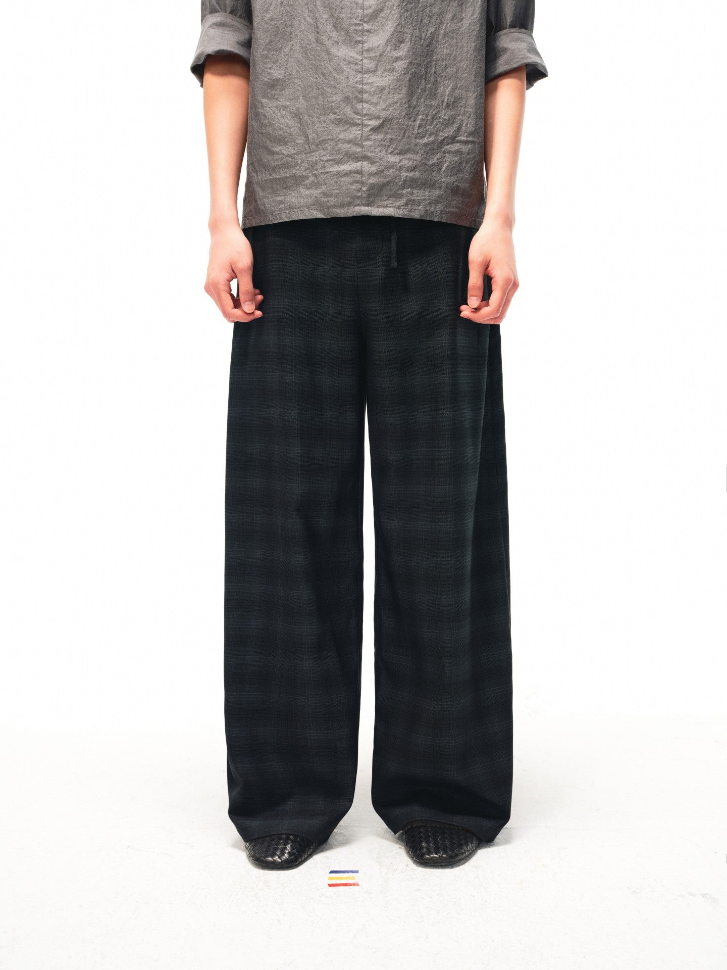 JCAESAR Checkered drawstring trousers with subtle grid pattern