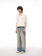 JCAESAR Hollow‑leaf patterned short‑sleeve knit shirt