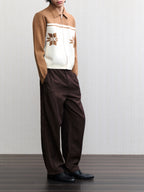JCAESAR Ribbed‑panel palm trousers