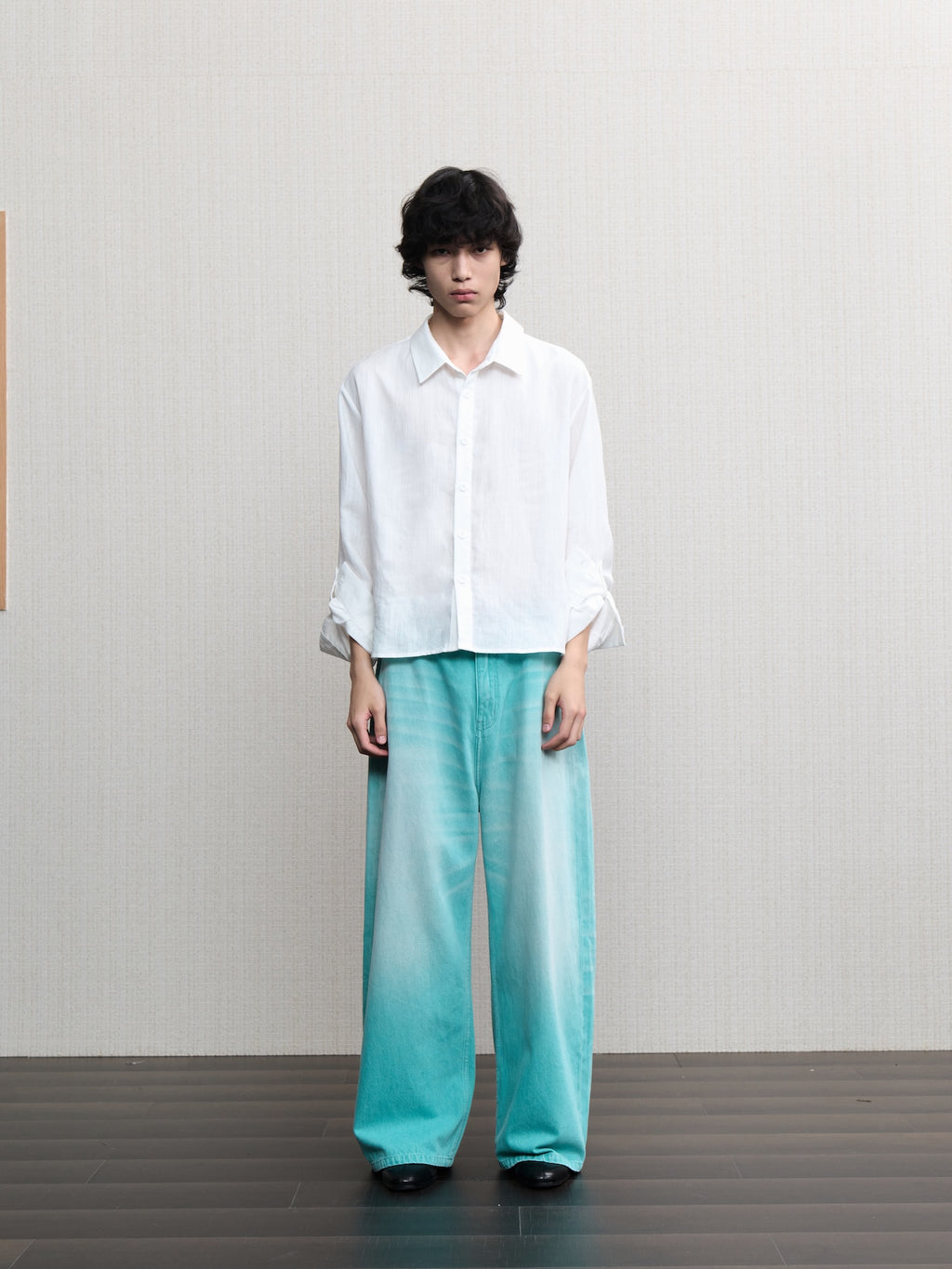 JCAESAR  Mint‑green washed denim jeans