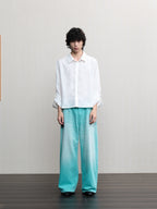 JCAESAR  Mint‑green washed denim jeans