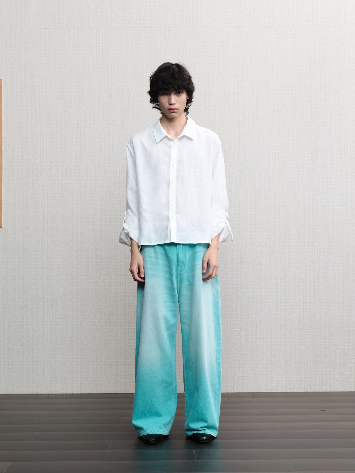 JCAESAR  Mint‑green washed denim jeans
