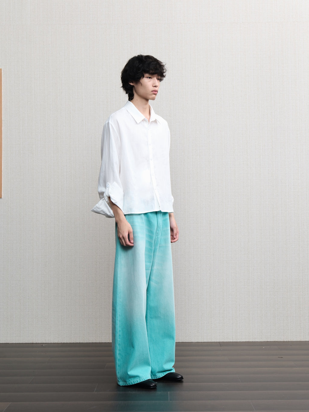 JCAESAR  Mint‑green washed denim jeans