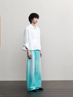 JCAESAR  Mint‑green washed denim jeans