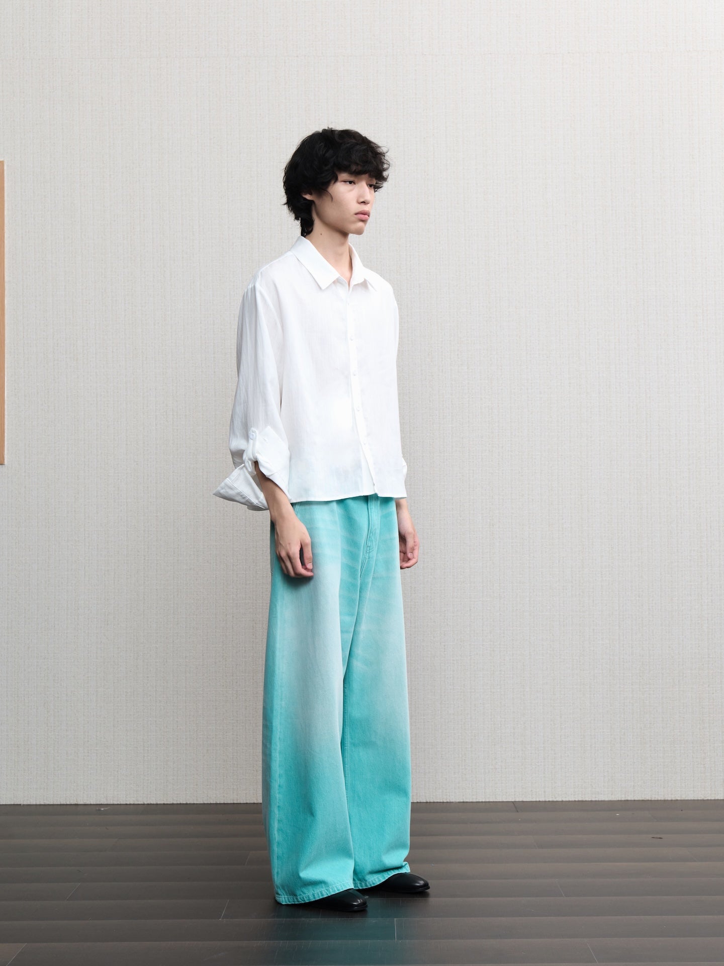 JCAESAR  Mint‑green washed denim jeans