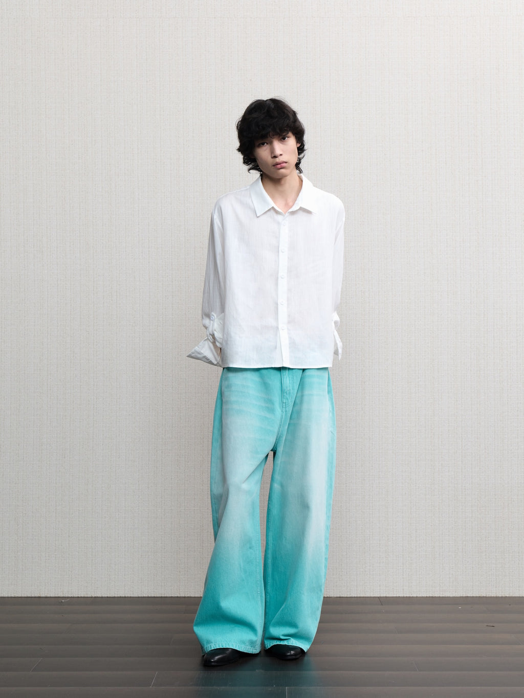 JCAESAR  Mint‑green washed denim jeans