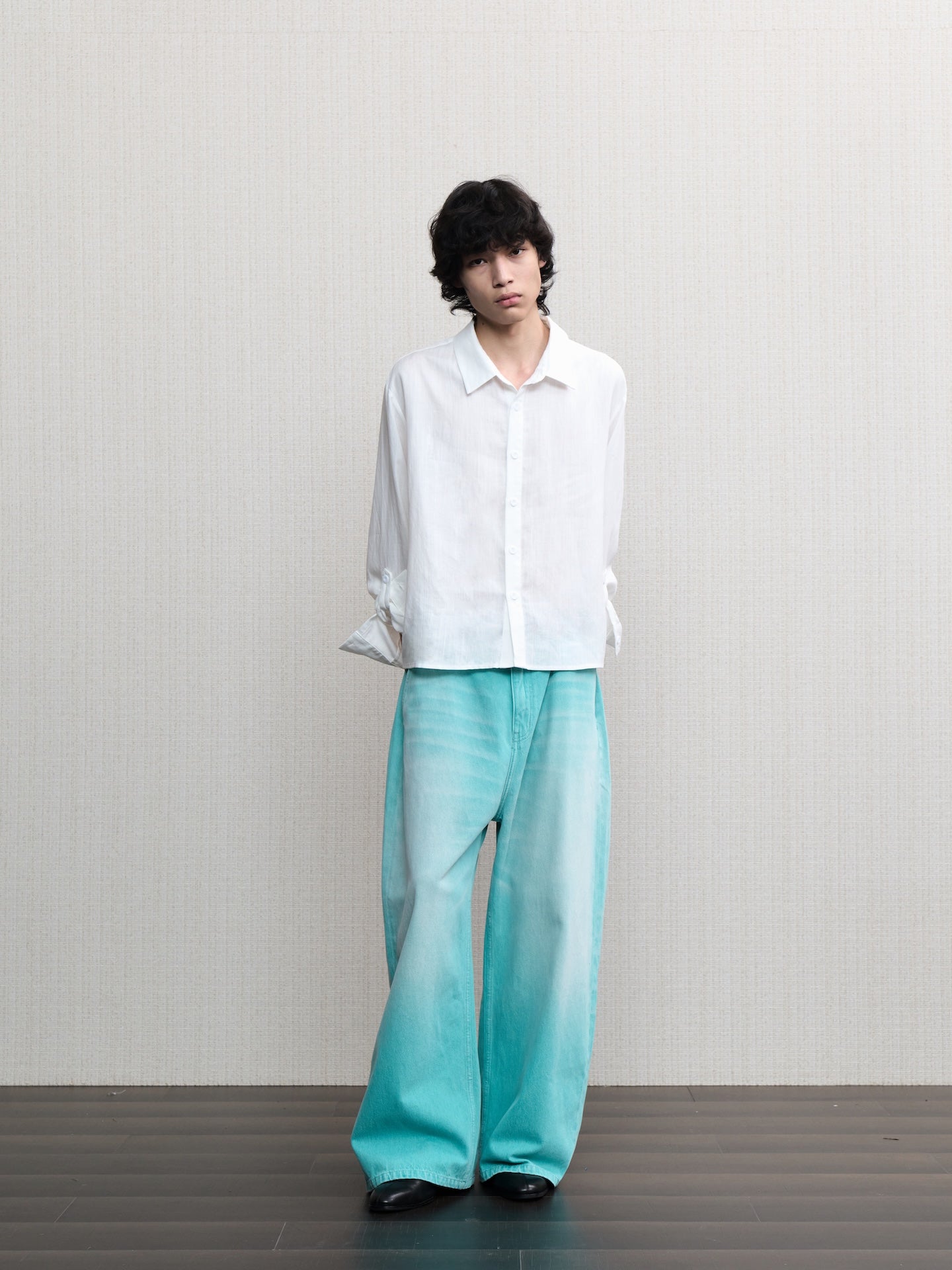 JCAESAR  Mint‑green washed denim jeans