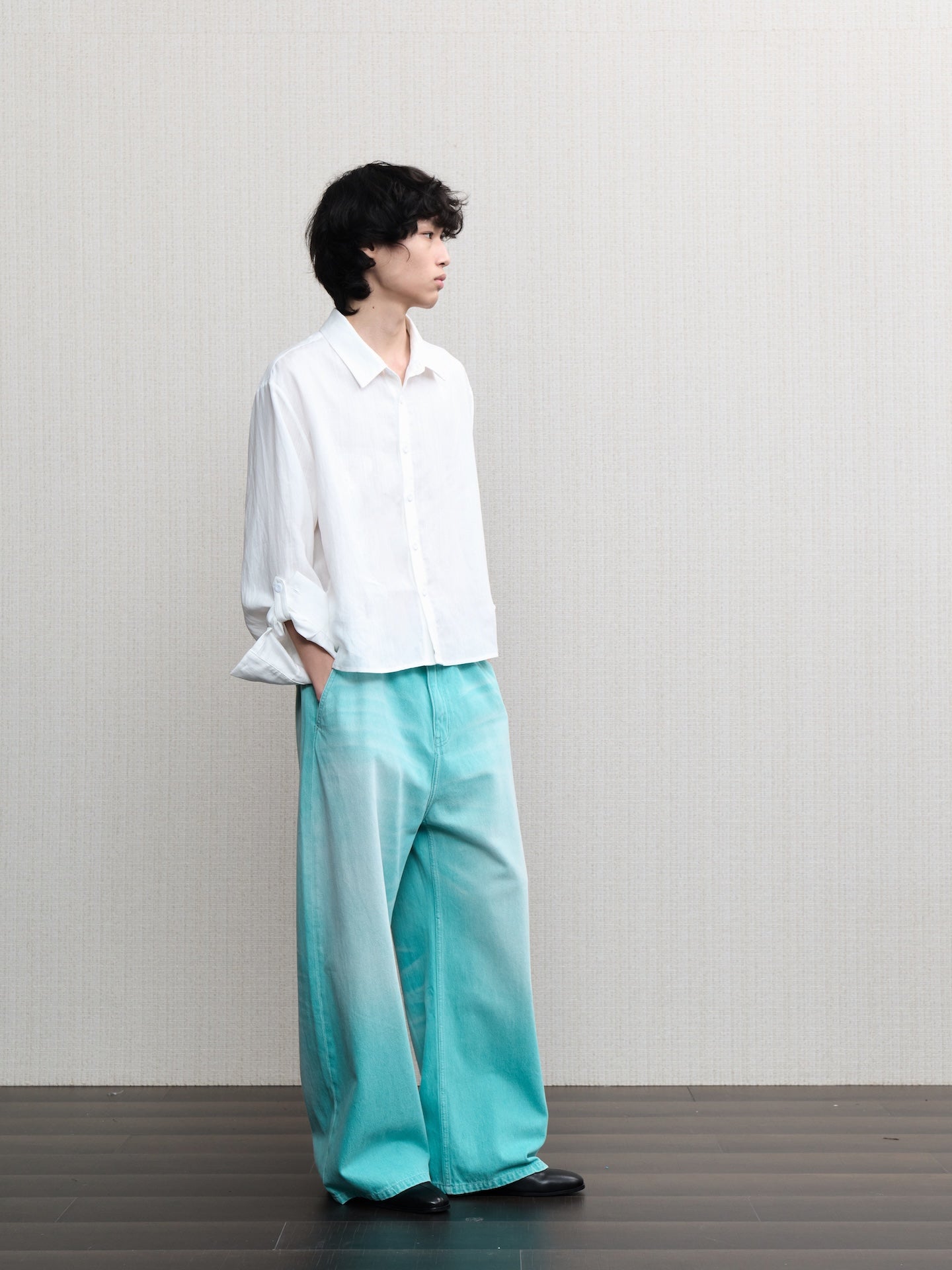 JCAESAR  Mint‑green washed denim jeans