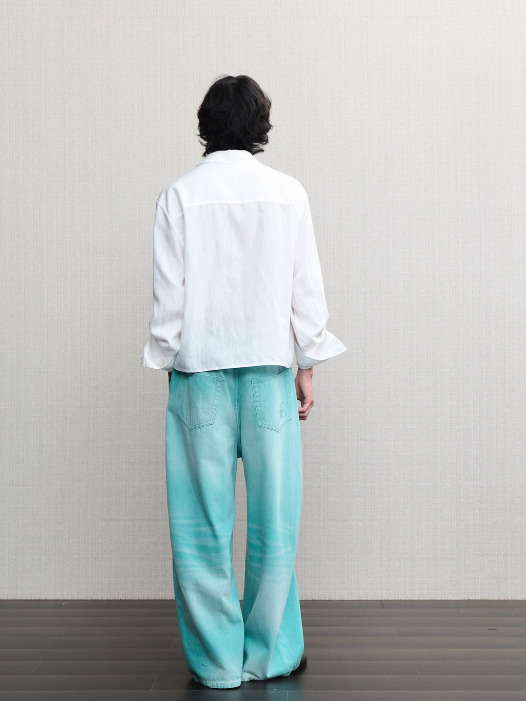 JCAESAR  Mint‑green washed denim jeans