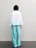 JCAESAR  Mint‑green washed denim jeans