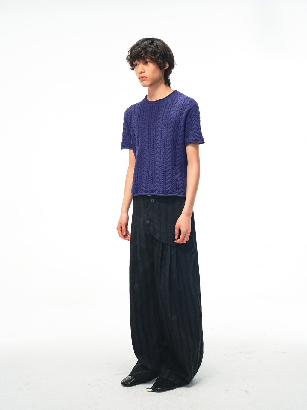 JCAESAR Armored‑style striped trousers with curved side panels