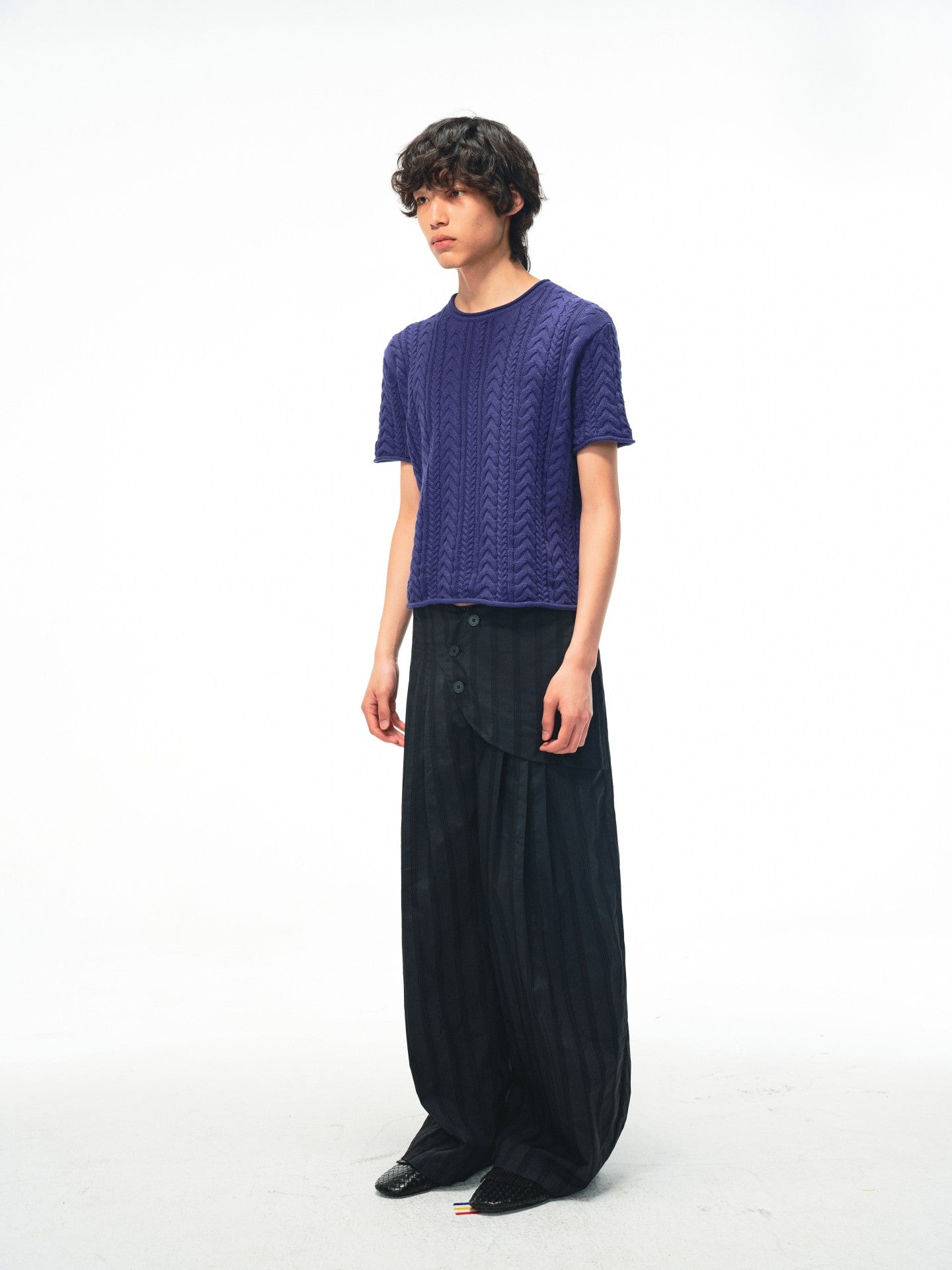 JCAESAR Armored‑style striped trousers with curved side panels
