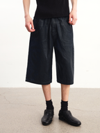 JCAESAR Wax‑Finished Denim Cropped Pants
