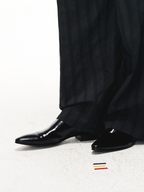 JCAESAR Split‑edge cowhide pointed‑toe black mirror mules