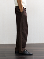 JCAESAR Ribbed‑panel palm trousers