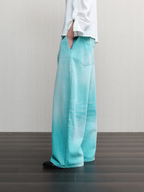 JCAESAR  Mint‑green washed denim jeans