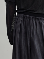 JCAESAR Pleated Striped Trousers with Ribbed‑Waist Panel - jcaesarclo