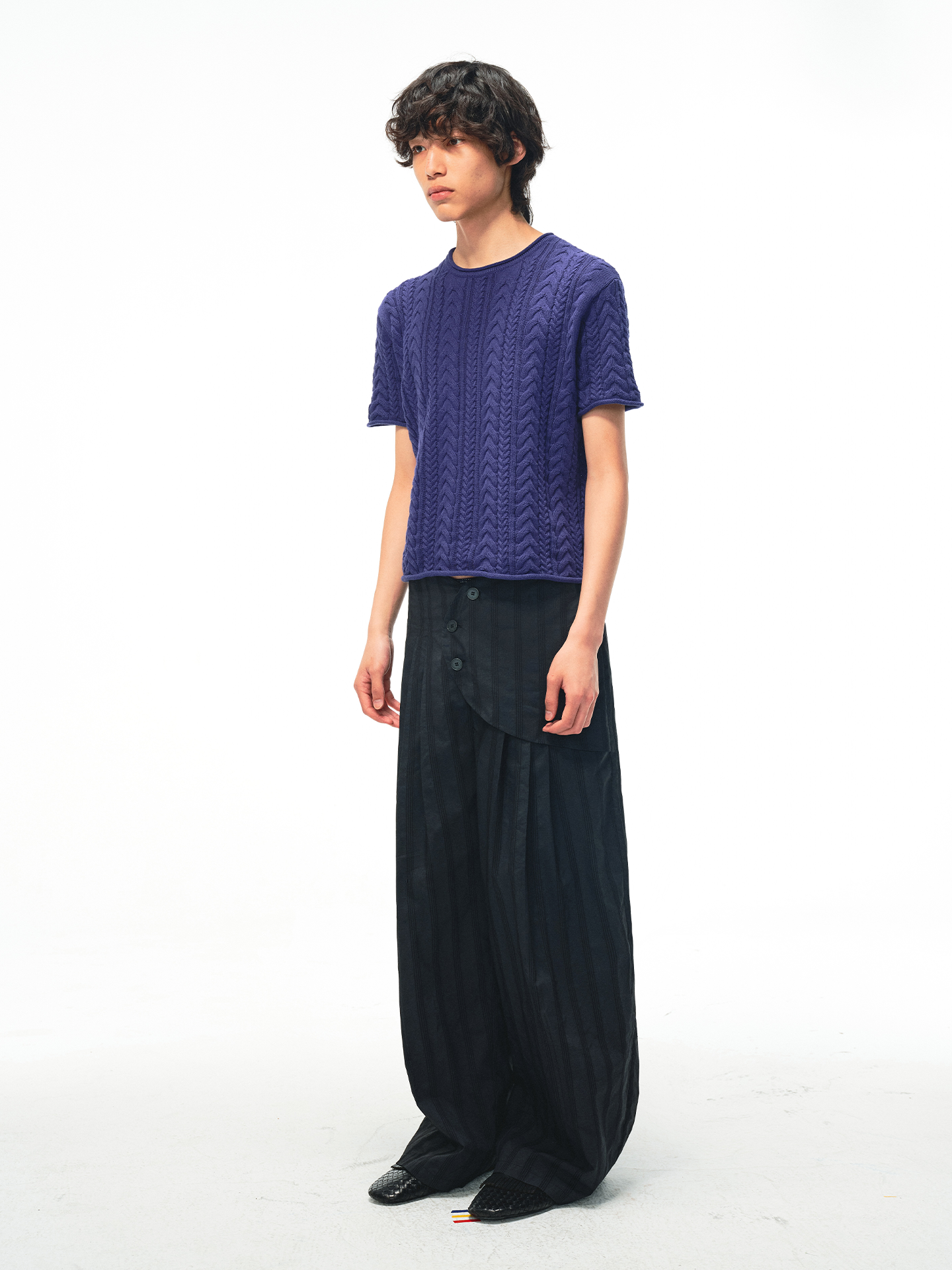 JCAESAR Armored‑style striped trousers with curved side panels